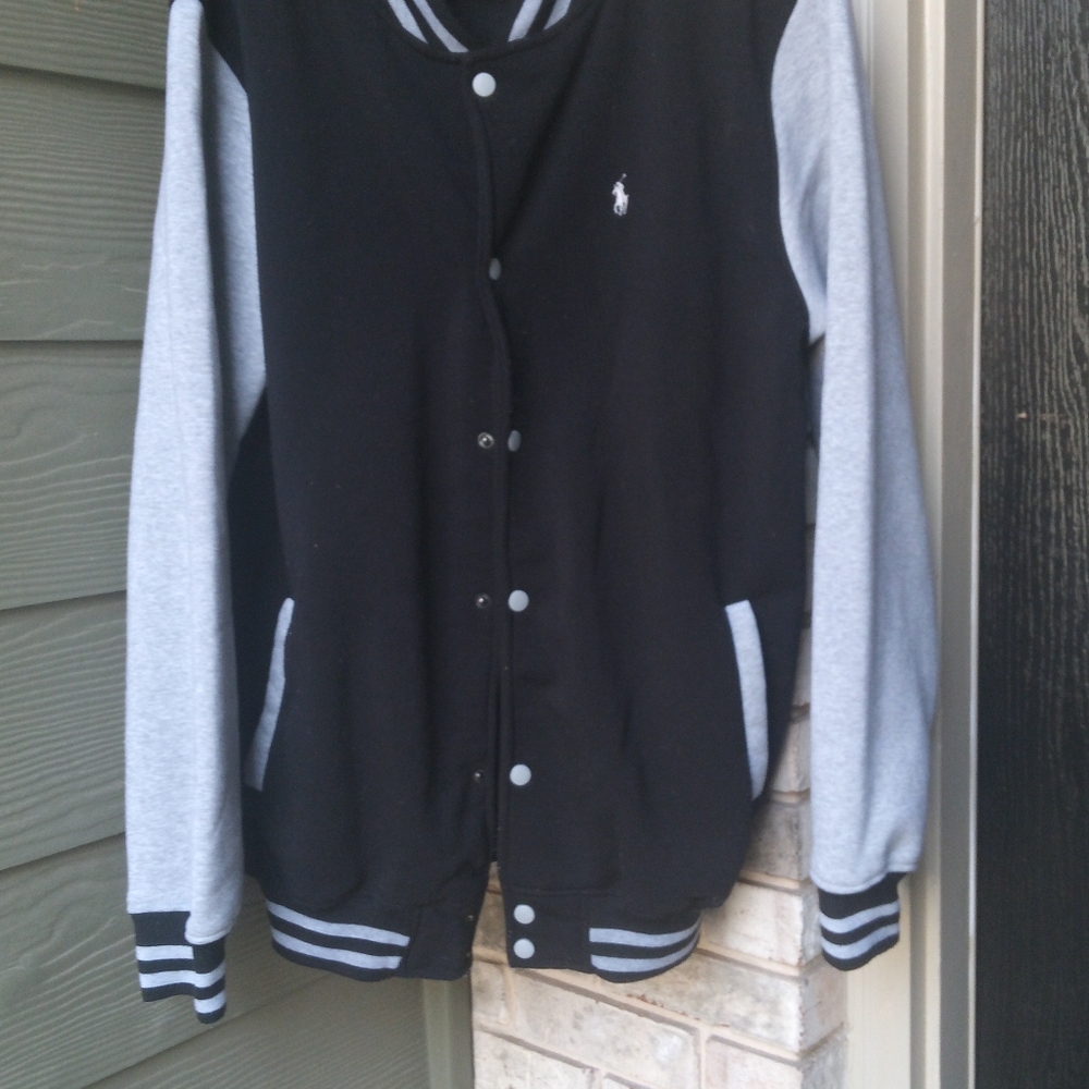 The Polo Ralph Lauren Men's Varsity black and gray Jacket with the iconic Pony l